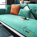 Earthy green-orange sofa cover, bringing warm, natural tones in anti-slip chenille fabric.
