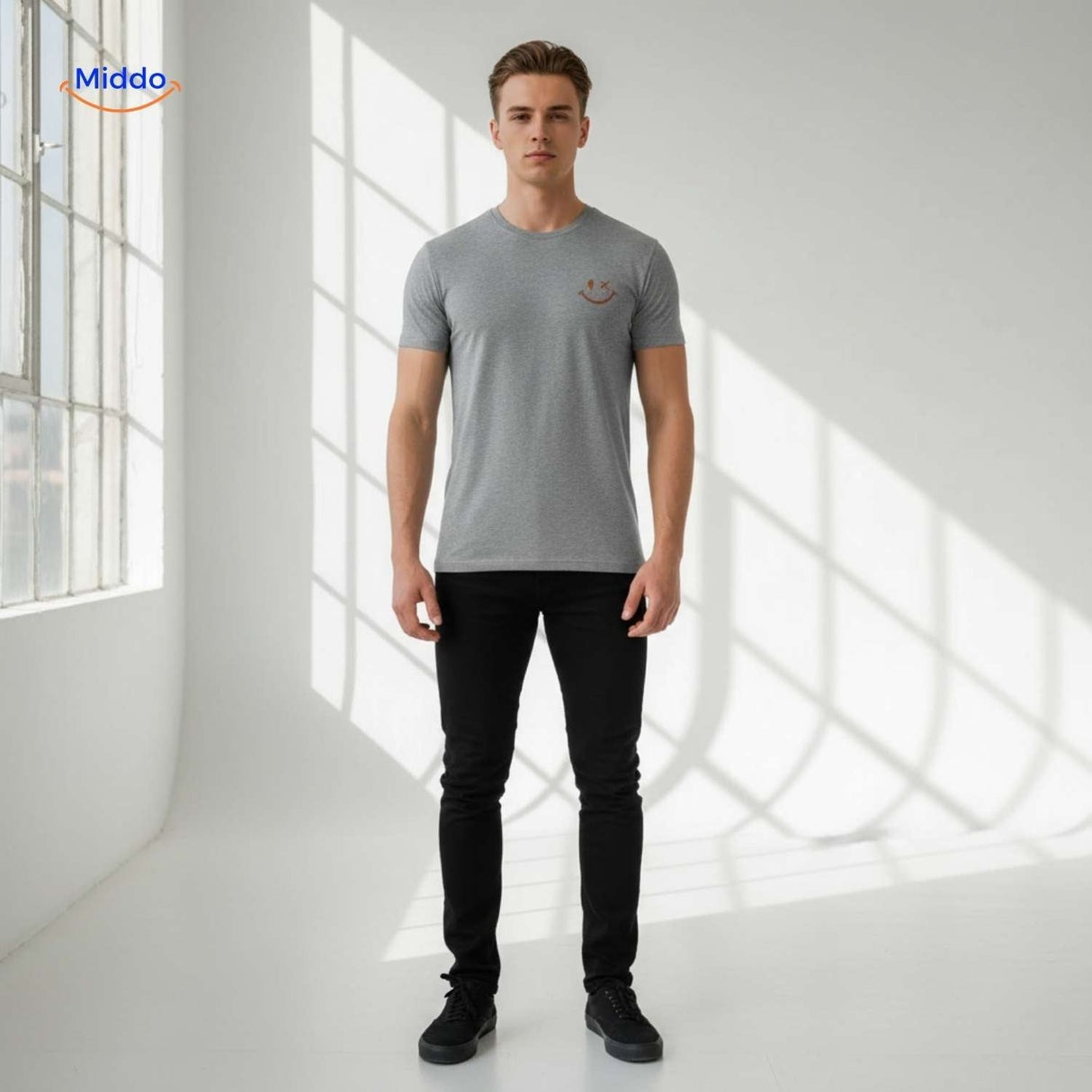 Grey cotton t-shirt with smiley print worn as basic casual piece.
