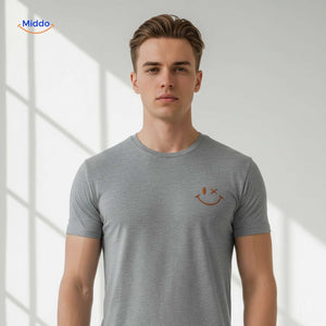 Close-up of smiley print detail on grey cotton t-shirt.
