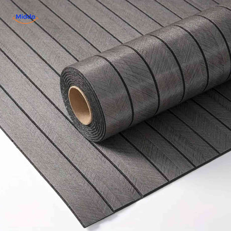Close-up of grey wood-grain 3D wall panel roll revealing textured slat detail.