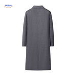 Back view of the grey mens long wool overcoat showing coat length and fit.