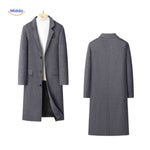 Grey long wool overcoat shown from both front and back to display full silhouette.
