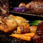 Precision meat thermometer in grill with food showing accurate readouts.