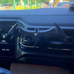 GripBat bat-shaped smartphone holder designed for secure car vent mounting.
