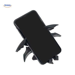 GripBat magnetic car phone holder securely mounted to vehicle dashboard.