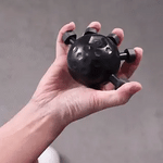 Finger exercises with GripFlex hand strengthener for improved grip power.