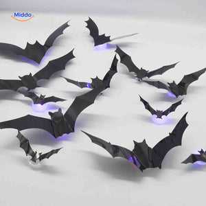 LED bat lamp display on table for Halloween decoration setup.
