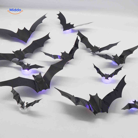 LED bat lamp display on table for Halloween decoration setup.