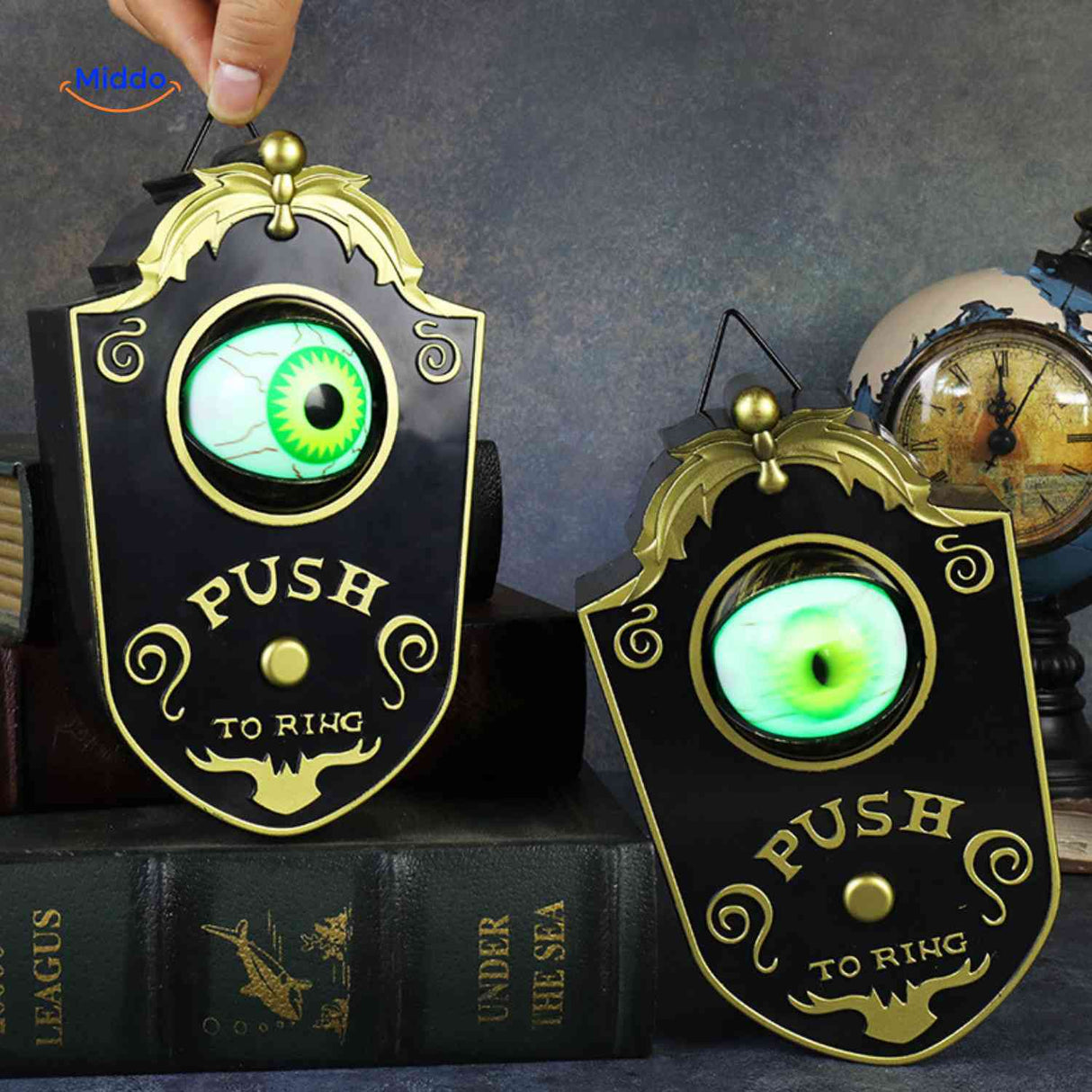 Halloween gadget doorbell with lighted green eye effect