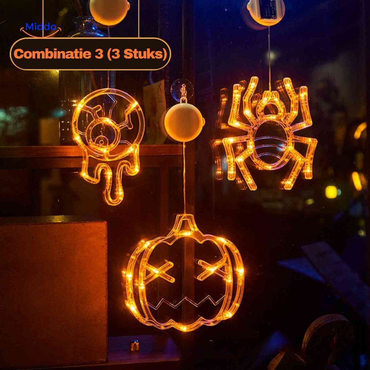 Halloween LED window lamp set with pumpkin, spider, and eye designs displayed in a window.