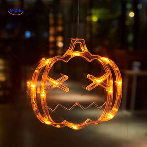 Halloween LED window lamp featuring a bright orange pumpkin design for spooky window display.