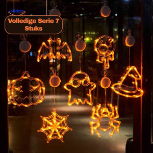 Complete set of 7 Halloween LED window lamps with assorted spooky shapes for full window display.