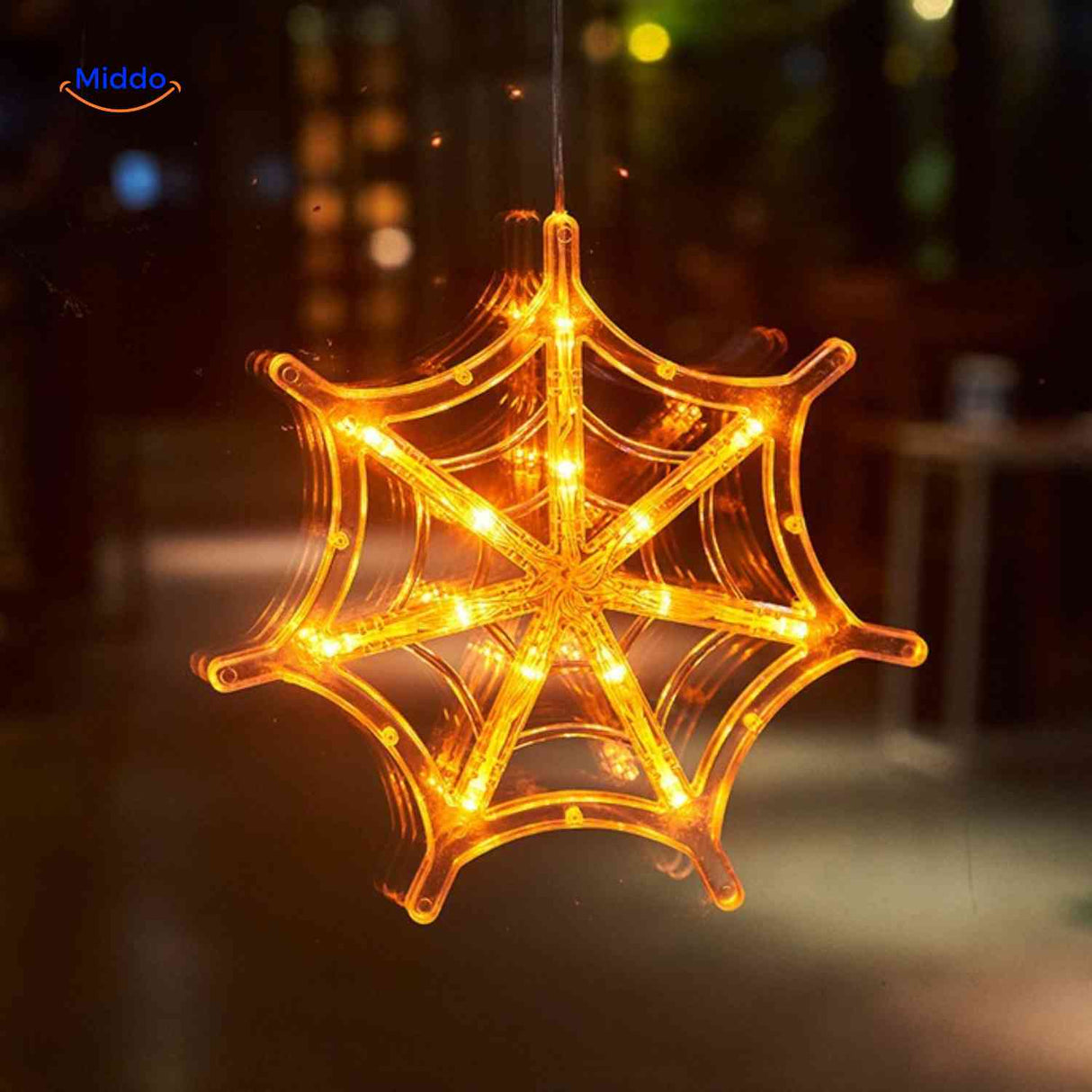 Halloween LED window lamp in a spiderweb shape, glowing orange for atmospheric Halloween decor.