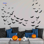 LED bat light mounted on wall for Halloween decoration effect.