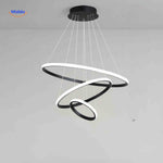 Black modern halo ring pendant with three LED rings for adjustable ambient lighting.