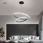 Black minimalist halo ring chandelier LED pendant with two rings in living room.