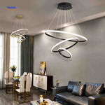 Halo ring dimmable pendant light as statement fixture in elegant living and dining space.