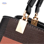 Handle detail and golden velcro closure mechanism of spacious tote.