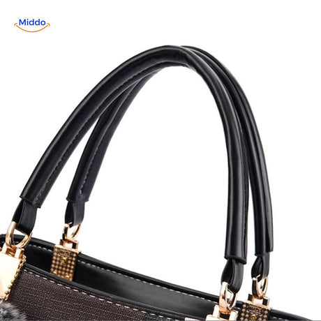 Close-up of handle attachment and bag connection quality.