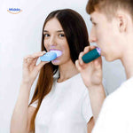 Automatic sonic toothbrush in hands-free holder with integrated blue light technology.