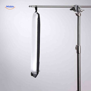 Suspended inflatable LED lamp on professional studio tripod for overhead lighting.