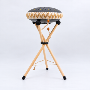 Harmonii KlankOase wooden stand shown with a large tongue drum for illustration, drum not included