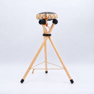 Harmonii KlankOase wooden stand shown with a small tongue drum for illustration, drum not included