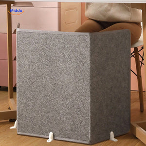 Electric leg warmer with non-slip base for office desk use.