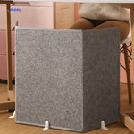 Electric leg warmer with non-slip base for office desk use.