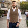 Herringbone wool vest in tweed with classic casual styling for men.