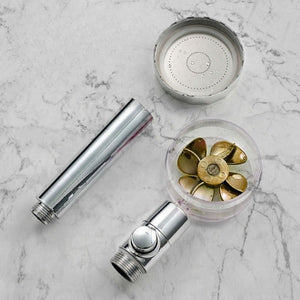 PowerShower shower head components and internal propeller mechanism in detail view