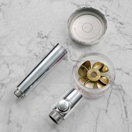 PowerShower shower head components and internal propeller mechanism in detail view