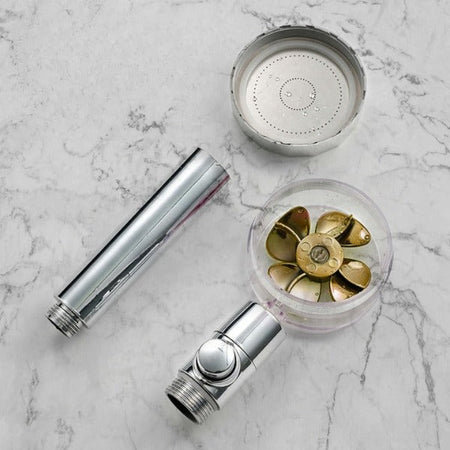 PowerShower shower head components and internal propeller mechanism in detail view
