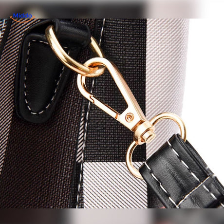 Close-up of hook design and leather quality details.