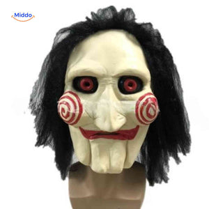 Horror-style latex mask with red eyes and intense aged expression.