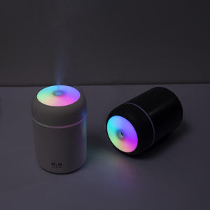 Humidifier with soothing LED night light mode, perfect for bedroom air diffusion.