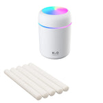 White humidifier model with replacement cotton swabs for essential oil diffusing.