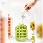 Filling ice bottle with water for fruity ice cubes without spilling