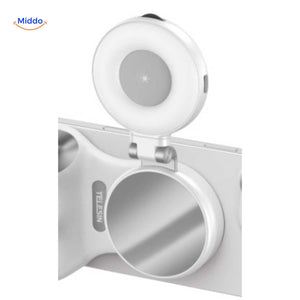 Illuminated ring light with mirror for professional selfies.