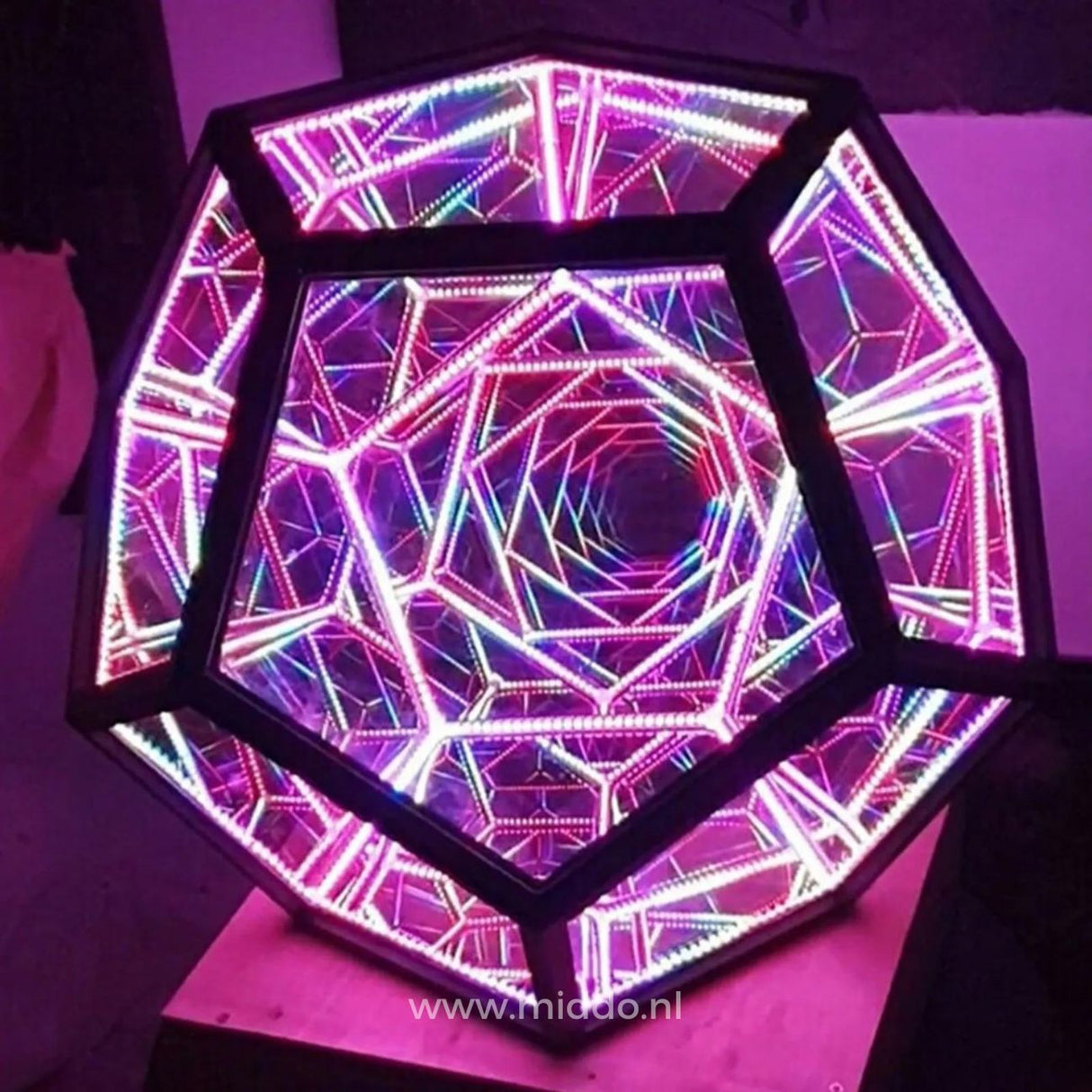 Infinity light sphere with soft pink glow and dimensional 3D effect.