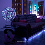 Infinity light sphere as ambient room decor creating atmospheric 3D glow.