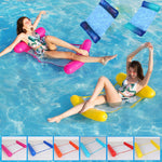 Person relaxing on inflatable water hammock in pool.