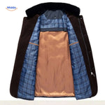 Quilted jacket interior with plaid lining and soft collar.