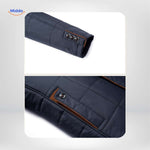 Quilted jacket sleeve with button cuff and pocket details.
