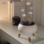 Jellyfish diffuser on desk producing cloudy aromatic mist in home workspace.