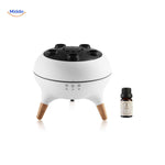 Jellyfish diffuser with essential oil bottle for aromatherapy and relaxation.