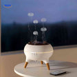 Jellyfish diffuser in evening mode with remote control for easy operation.