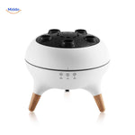Modern jellyfish diffuser with elegant wood-look legs and minimalist design.