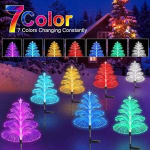 JellyGlow solar-powered jellyfish garden light with colorful fiber optic tree decorations glowing at dusk