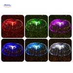 JellyGlow solar jellyfish light with multi-colored lamps creating vibrant garden glow